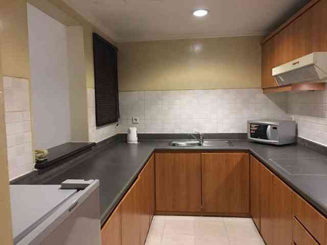 Sewa Apartemen Grand Tropic Suites Apartemen