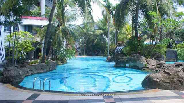 Sewa Apartemen Grand Tropic Suites Apartemen